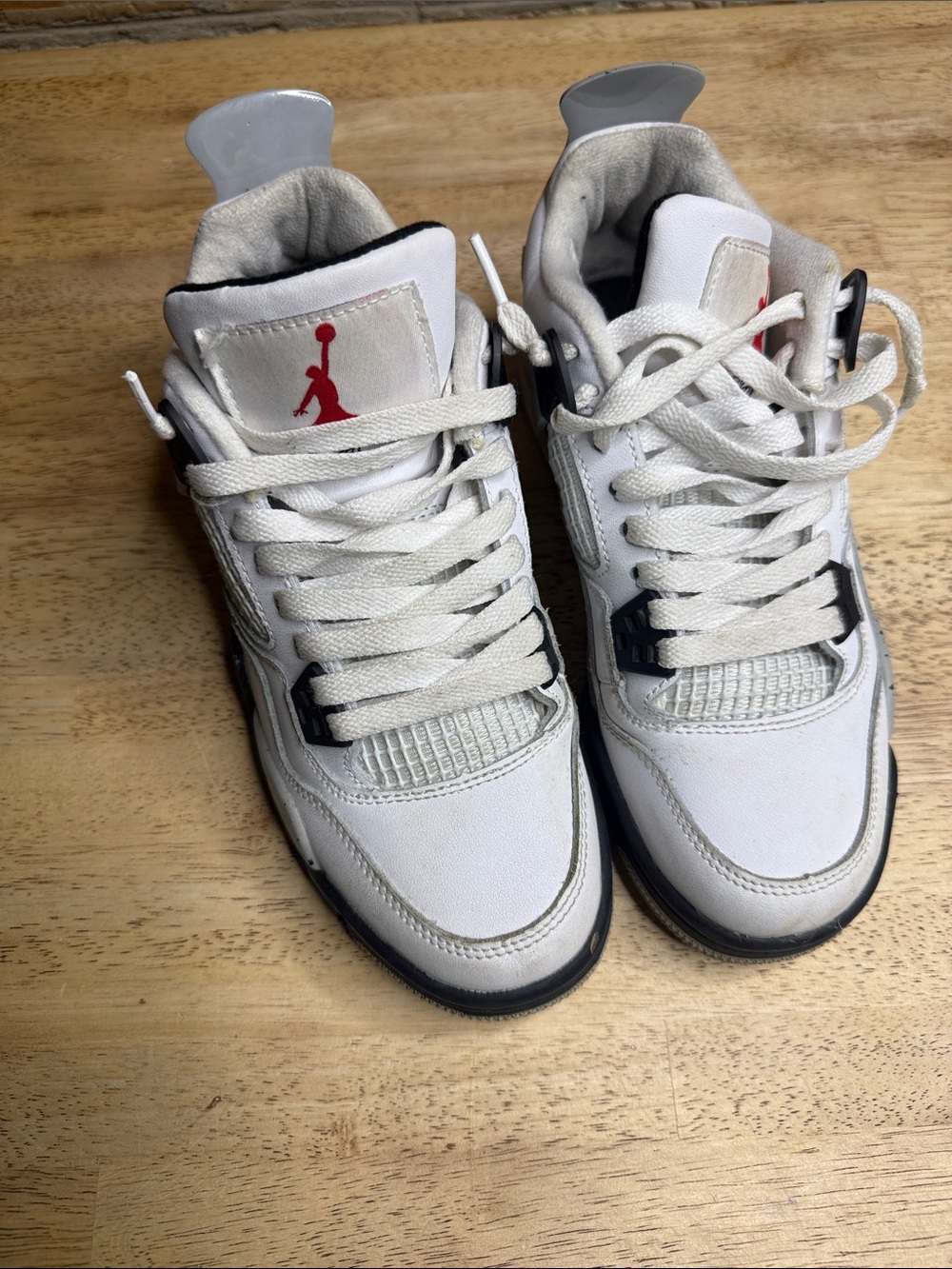 Jordan Kids White Sneakers with Black Trim and Red Jumpman